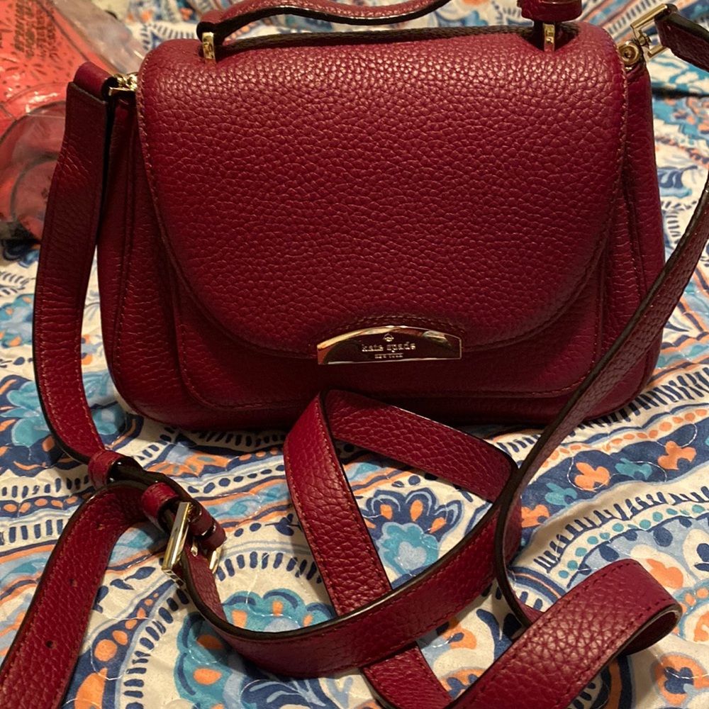 Dark red kate spade crossbody bag